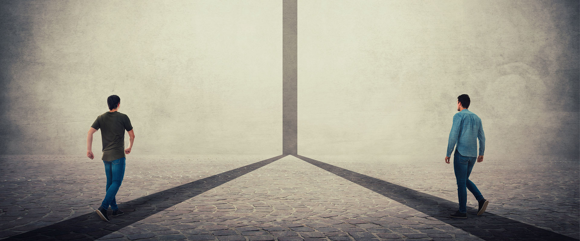 Two-Men-Walking-On-A-Pavement2